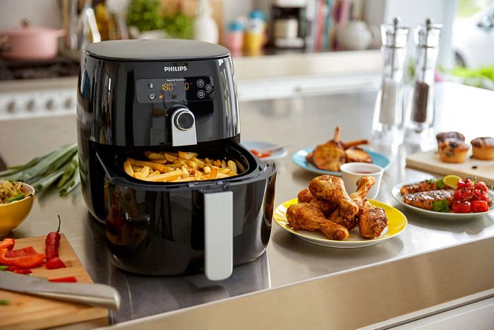 A versatile kitchen appliance, the black air fryer, sits on the counter.