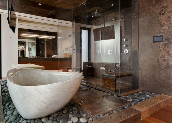 A stylish bathroom with a large tub.