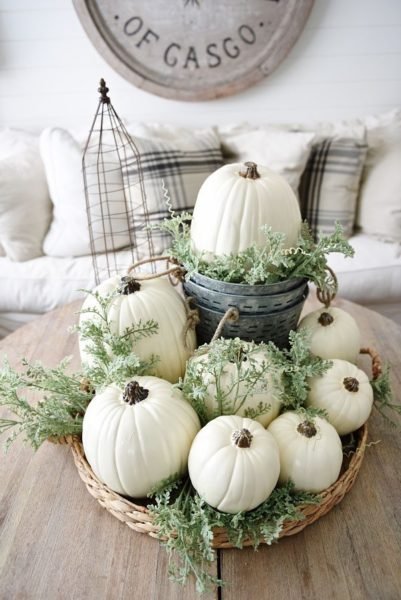 Fresh fall decorating with white pumpkins in a basket.