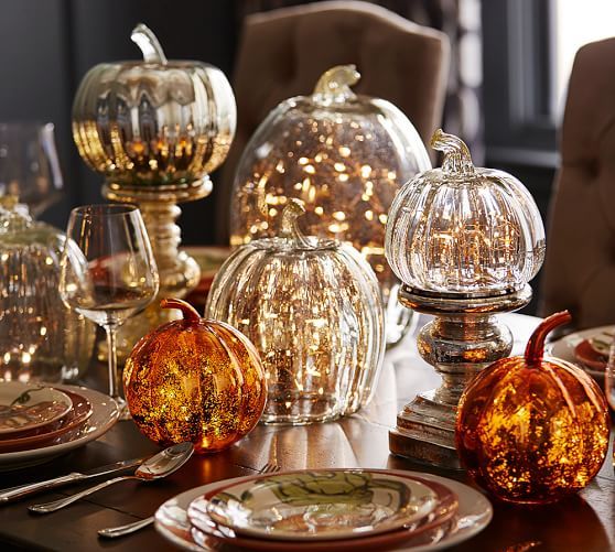 A table is set with fresh fall decorating.