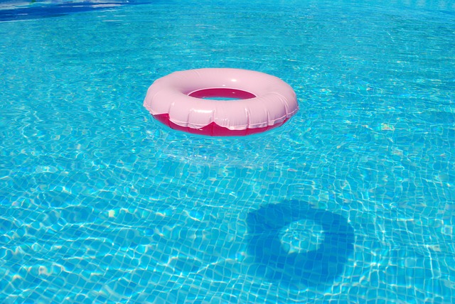 An inflatable ring floating in a pool, highlighting common pool problems.