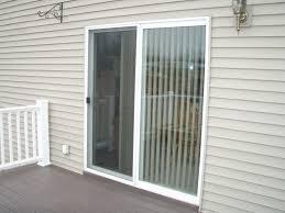 A sliding glass door on a deck with bifold doors.