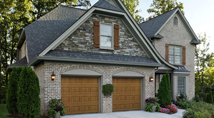 A house with a brown garage door.