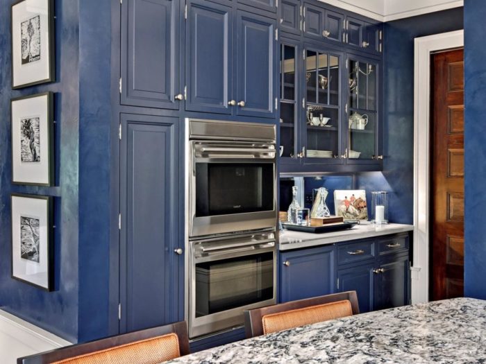 Update your kitchen with blue cabinetry and granite counter tops.