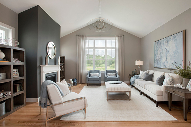 How to create a living room with gray walls and white furniture.