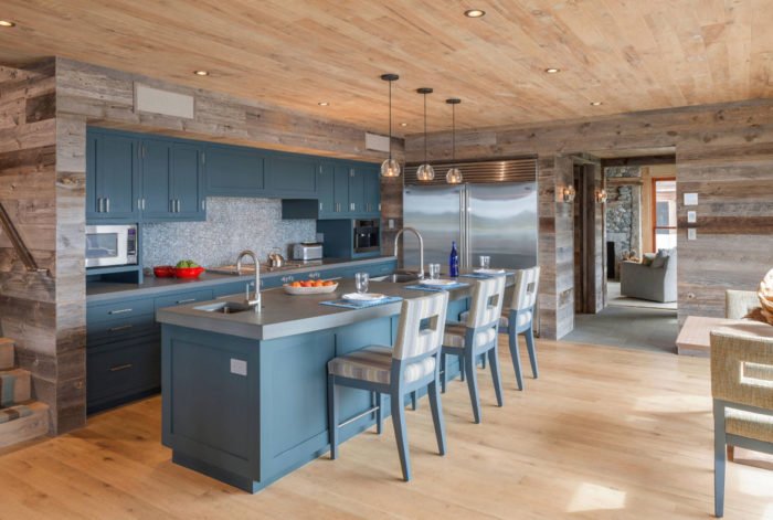 Update Your Kitchen with Blue Walls and Wooden Floors.