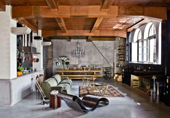 An industrial style living room with wooden beams, designed to make your home more comfortable.
