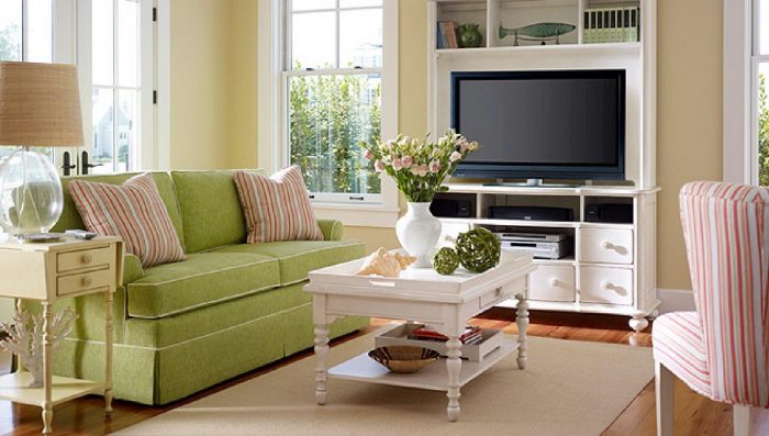 Spruce up living room with a green couch.