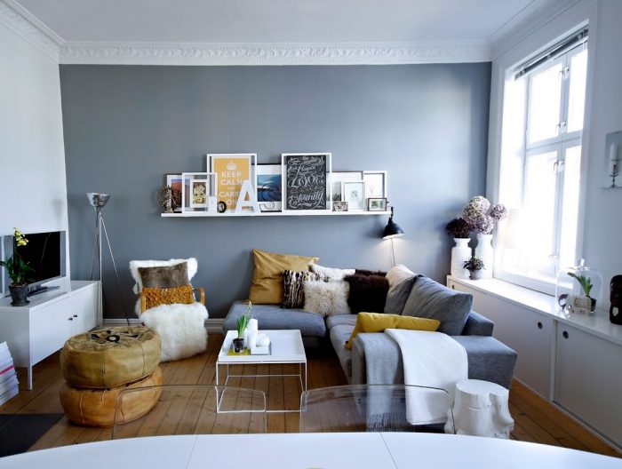 Spruce up your living room with grey walls and yellow accents.