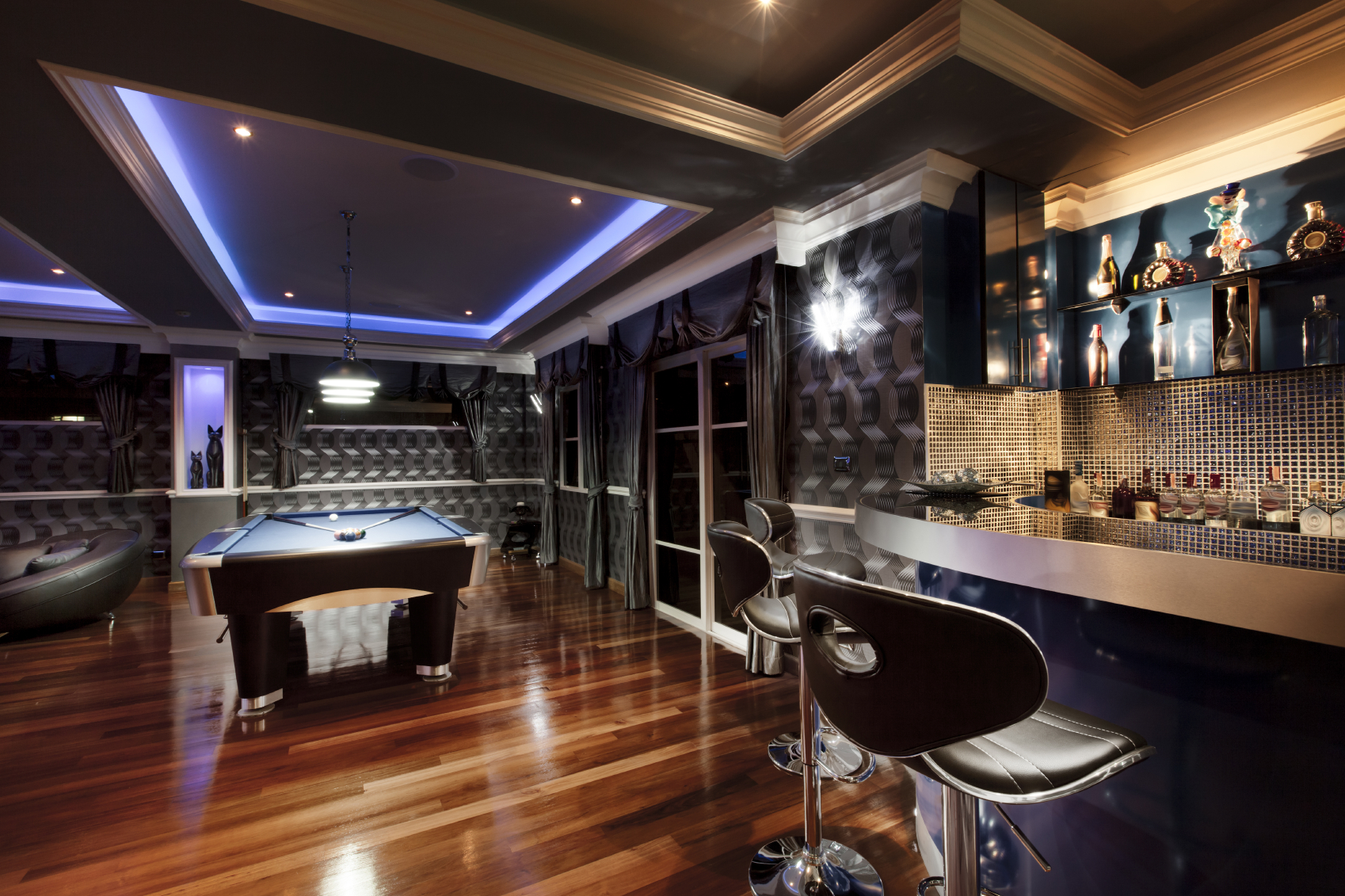 Man cave with a pool table.