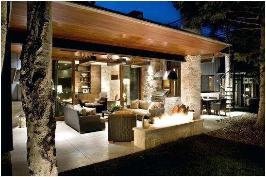 A modern outdoor living area with a fire pit perfect for outdoor gatherings.