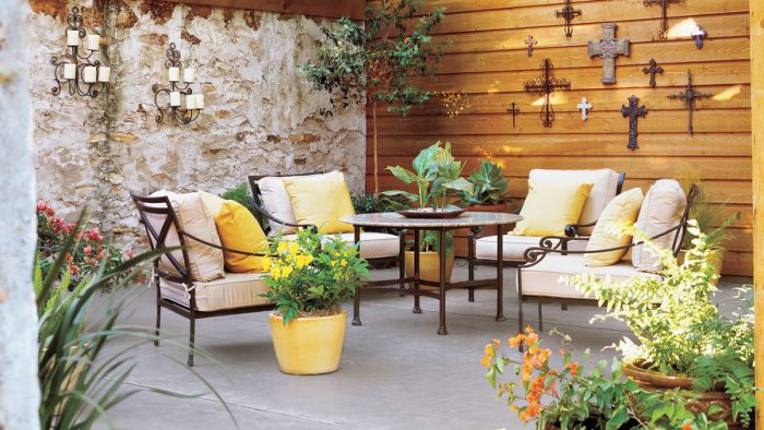 A prepping patio with a table and chairs.