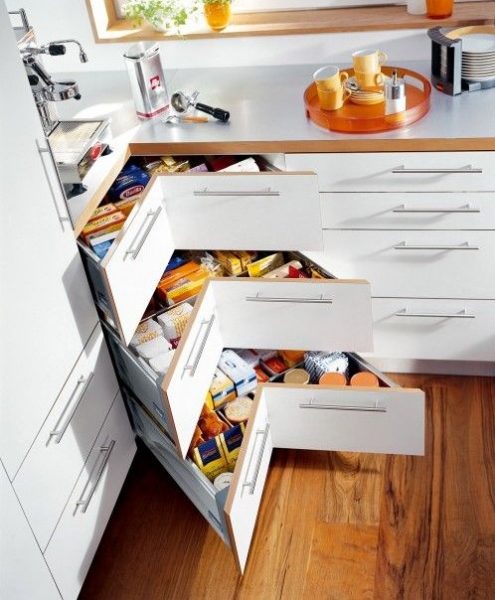 A kitchen with a lot of drawers and seven storage ideas for small homes.