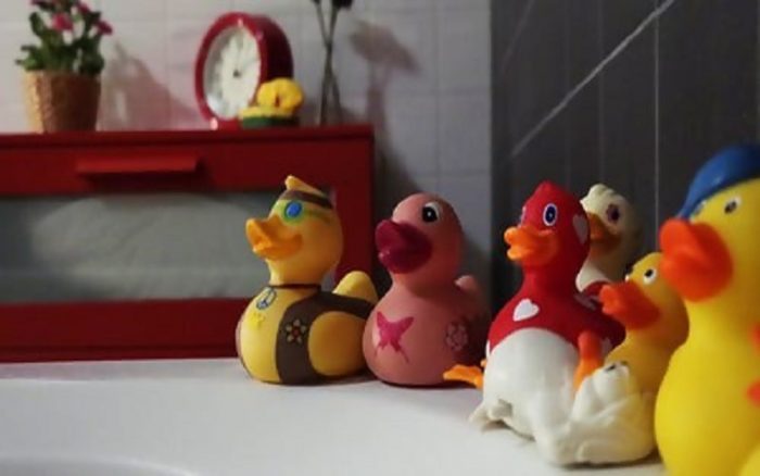 A group of rubber ducks in a children's bathroom.