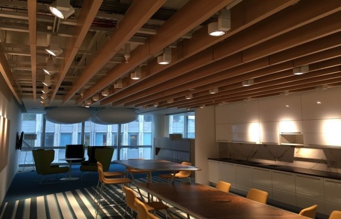 An office with wooden ceilings.