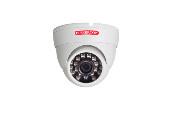 A white CCTV camera for a security system on a white background.