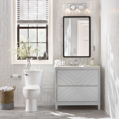 A bathroom upgrade featuring white tile and a window.