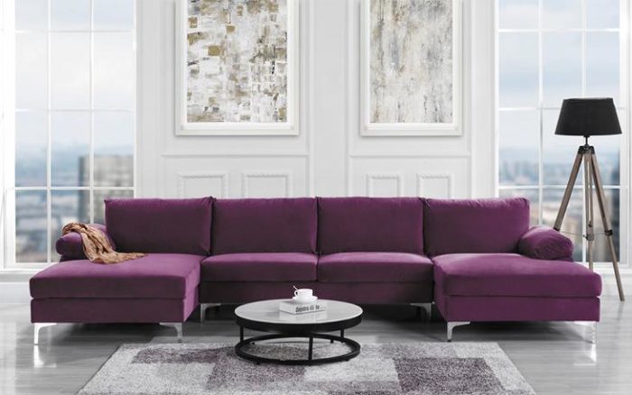 A purple sectional sofa for trade.