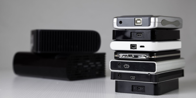 A stack of portable electronic devices.