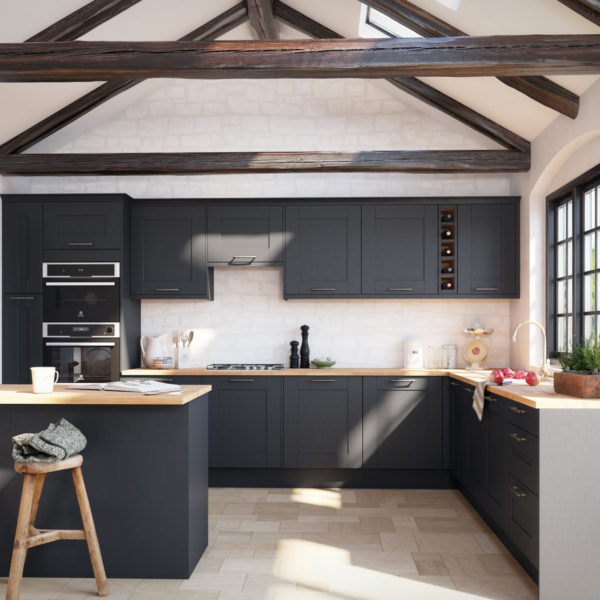 A kitchen designer with black cabinets and wooden beams.