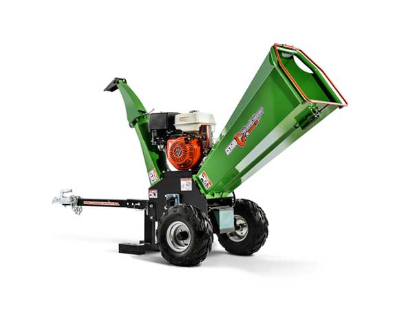 A green wood chipper on a white background
