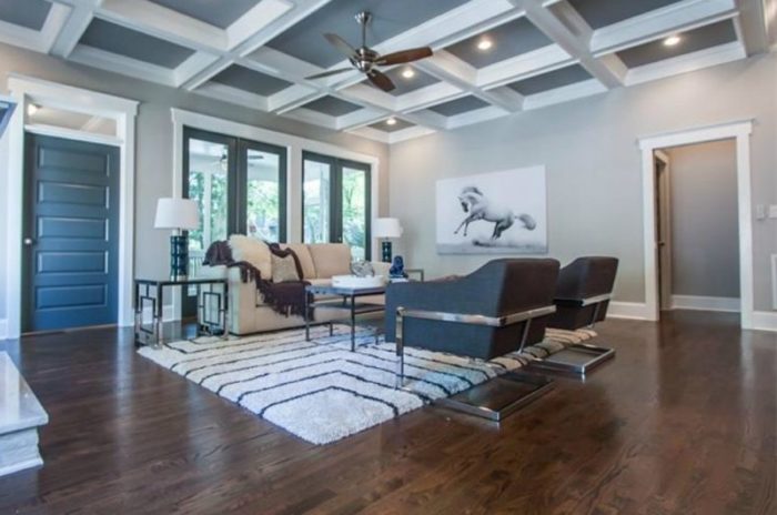 Modernise your living room with hardwood floors and a ceiling fan.