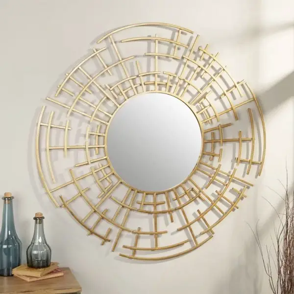 A circular gold mirror.