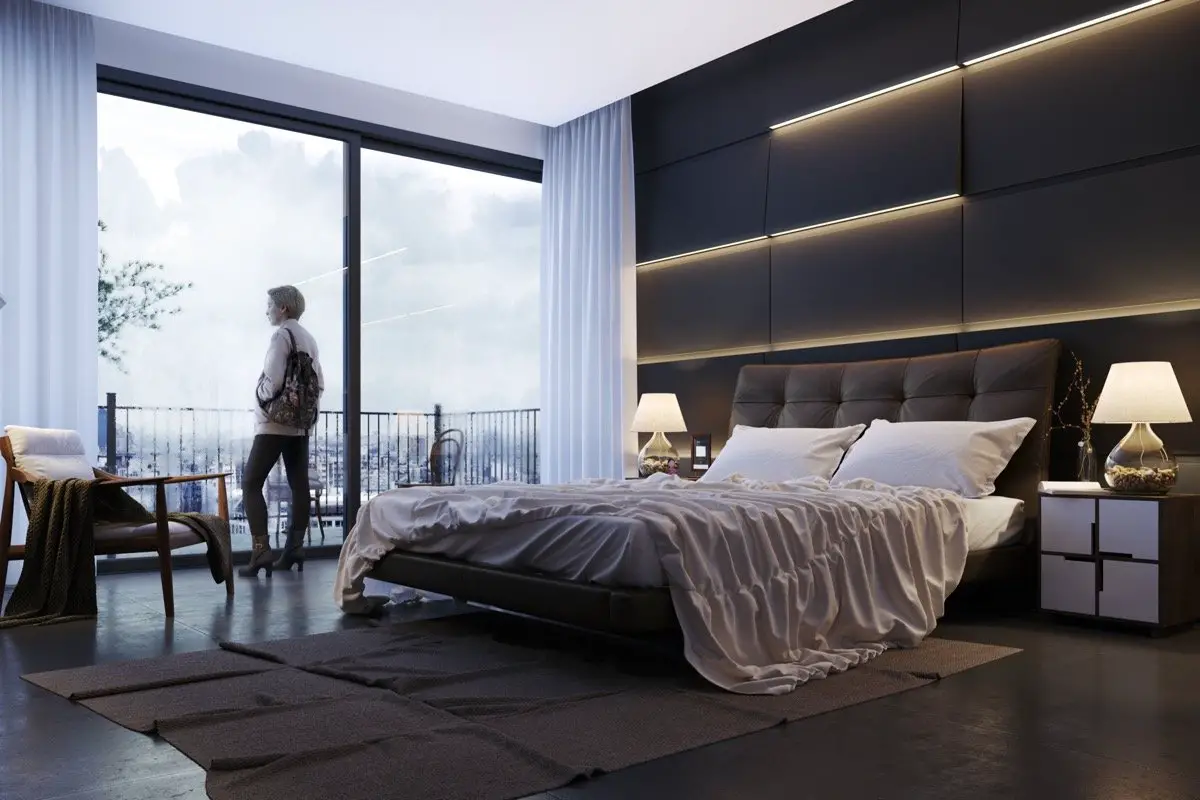 Modern bedroom interior with large window and person standing.