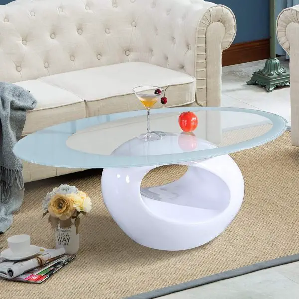 A white coffee table with an amazing glass top.