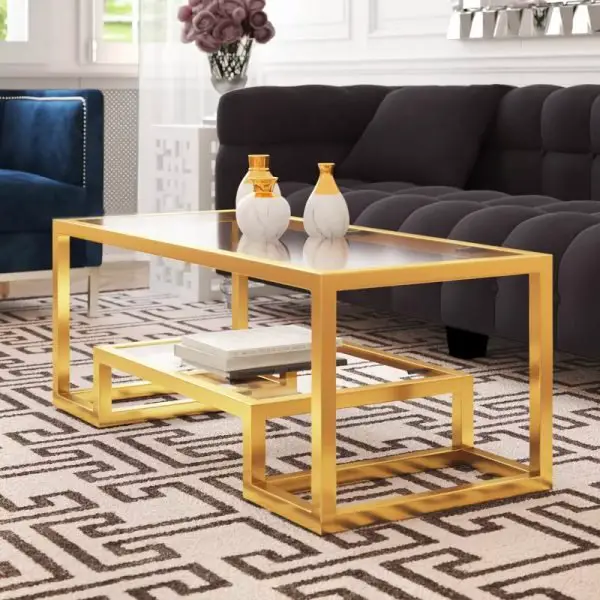 A stunning gold coffee table in a modern living room.