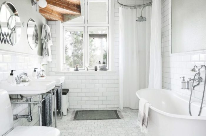 Modernise your home with a white bathroom featuring a bathtub and sink.