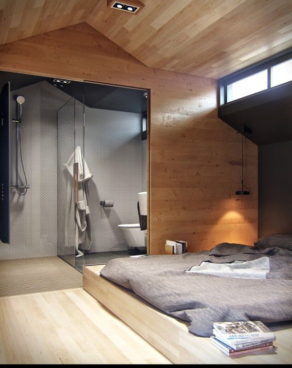 A bedroom with a shower.