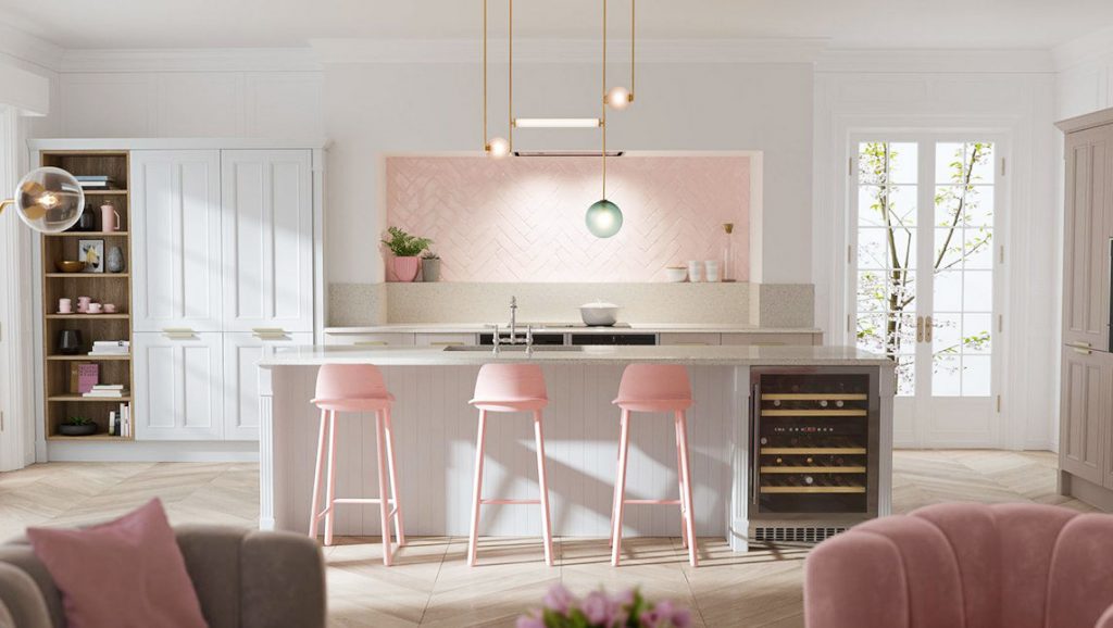 A kitchen with pink stools and chairs.