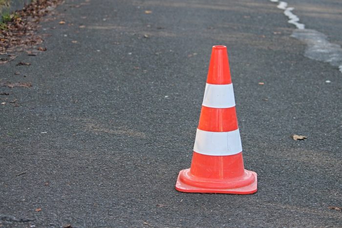 Orange and white traffic cone.