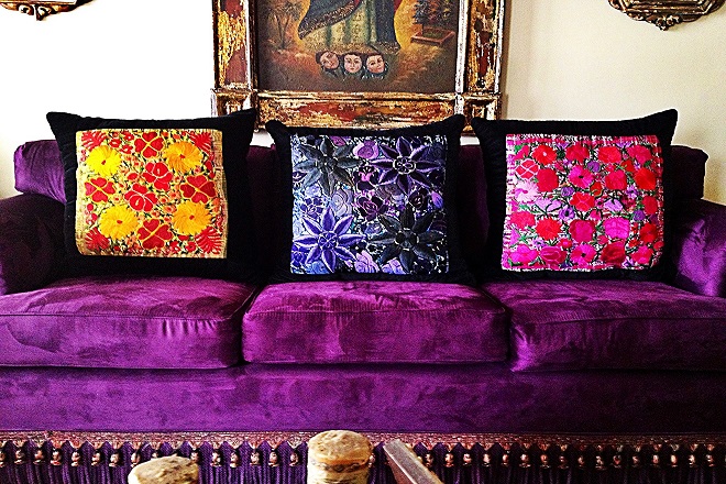 Colorful pillows in a room.