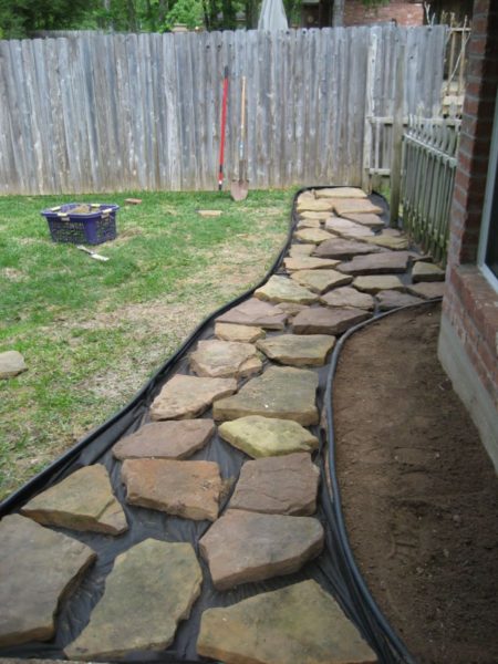 DIY garden path with stones.