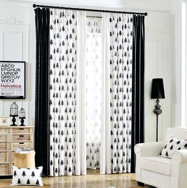 Black and white window treatments in a living room.