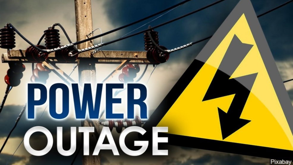 12 Ways to Prepare for Any Power Outage with a power outage sign on a power pole.