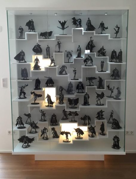 Description: A display case filled with collectible figurines.