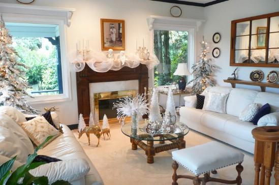 A festive white living room decorated with Christmas embellishments.