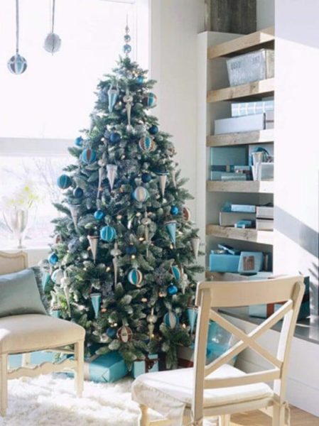 A Christmas tree in a living room.