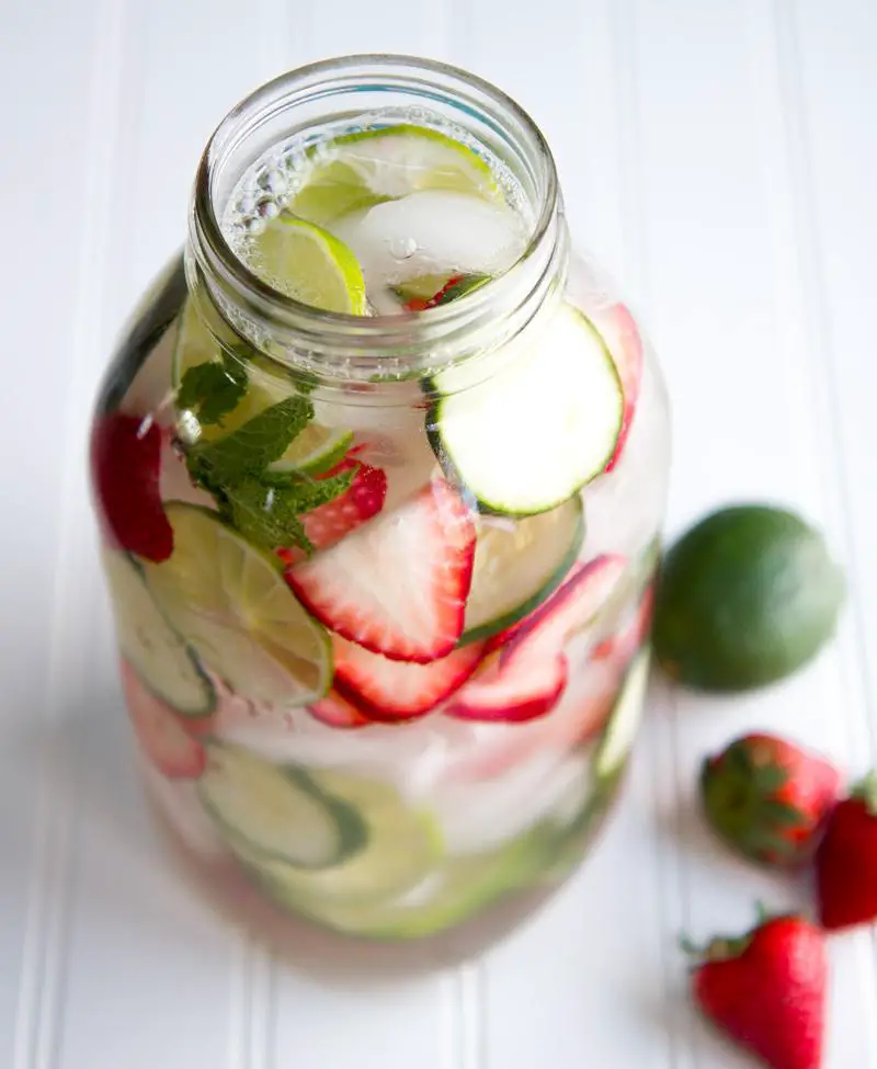 A spa-inspired jar with strawberries, cucumbers and limes.