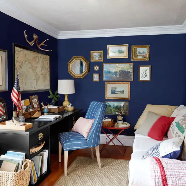 A house with blue walls and an American flag on the wall.