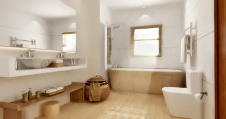 A bathroom with wooden floors and wooden furniture featuring a bathroom shelf.