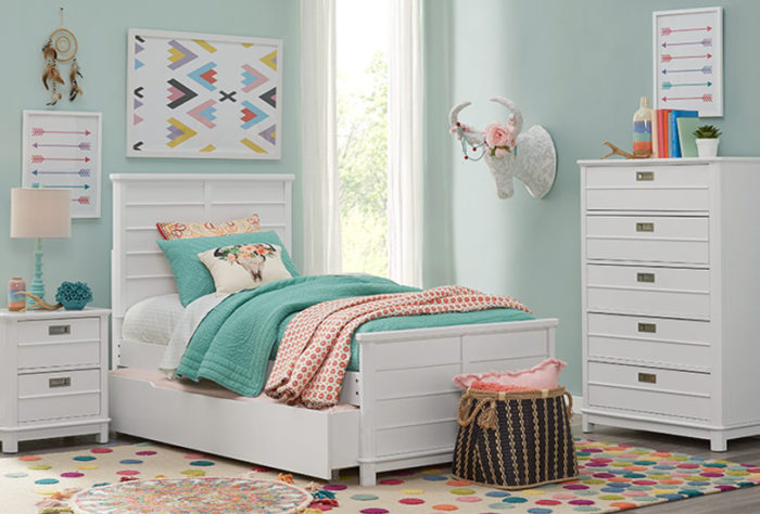 Design a girl's bedroom with a bed and dresser.