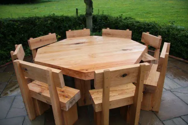 An octagonal table and chairs made out of wood, perfect for woodworking projects.