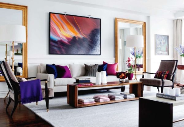 A living room with colorful furniture showcasing decor trends.