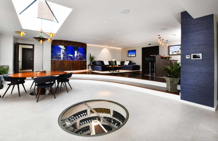 A modern living room with a circular floor, showcasing contemporary interior design.