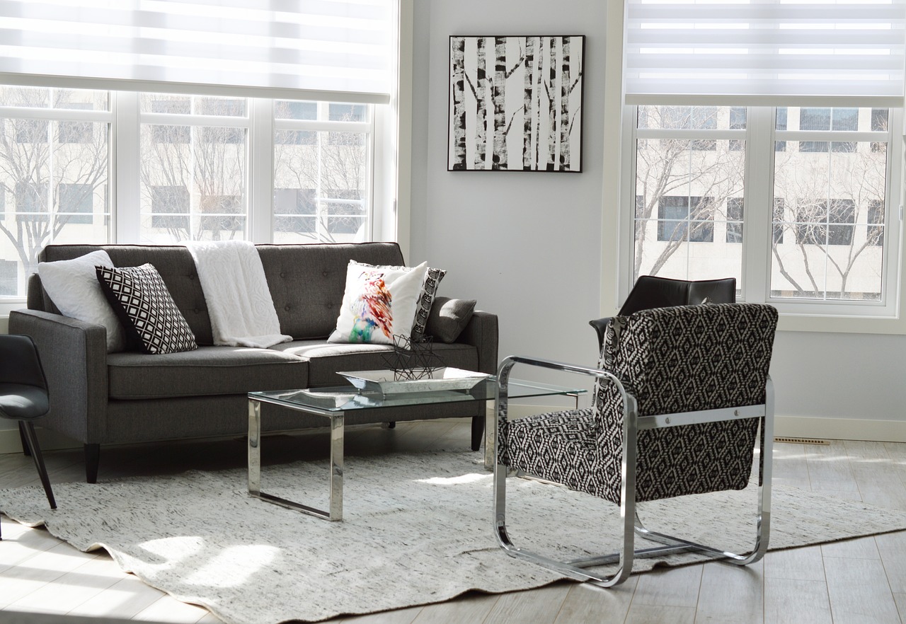 A home decor featuring a gray couch and a coffee table.