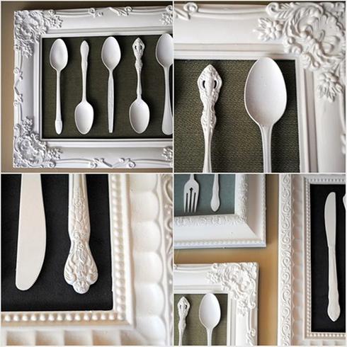 A decorated collection of pictures of forks and spoons in a framed display.